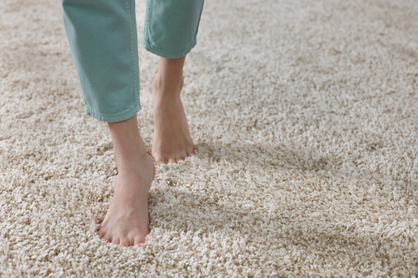 person walking on clean carpet
