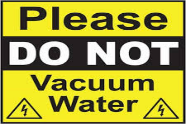 Vacuuming Water Warning